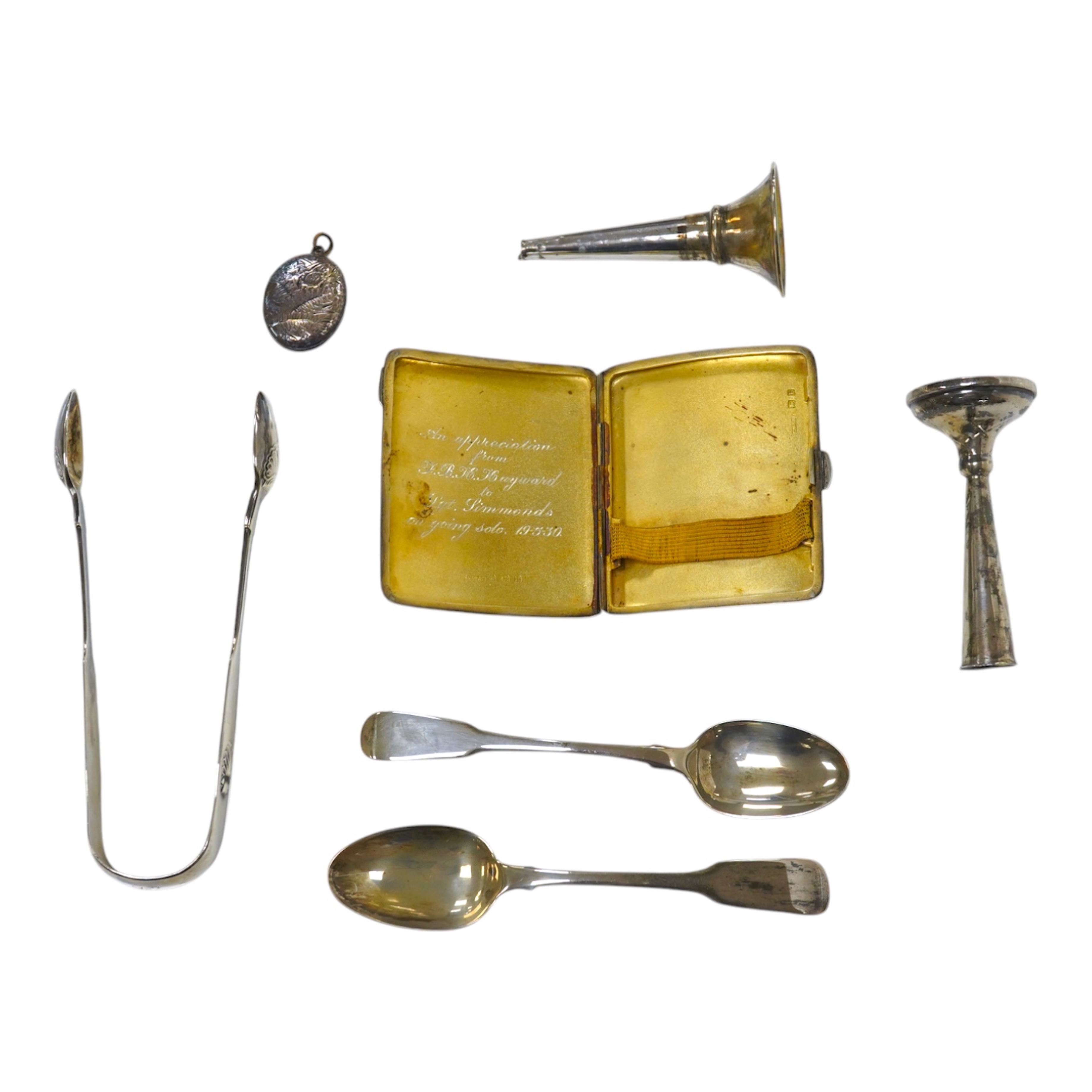 Small silver including a cigarette case, two teaspoons, a pair of provincial sugar tongs, a posy vase, damaged vase and a Victorian oval locket. Condition - poor to fair